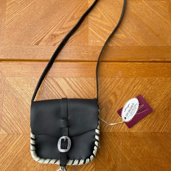 Handbags - NEW Leather mini purse , brand new with tags